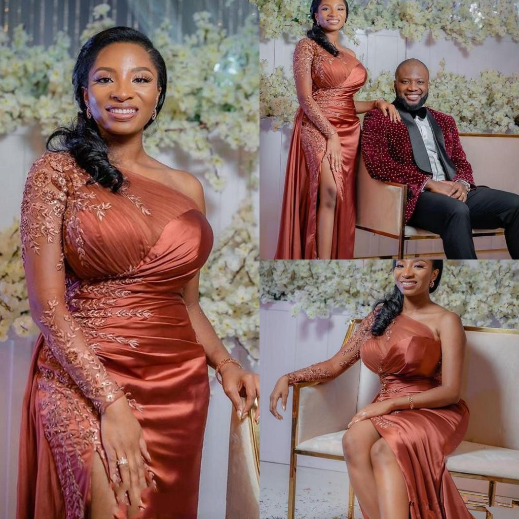 African One Shoulder Mermaid Prom Dresses with Pleats Lace Applique Long Sleeve Side Split Evening Gowns Plus Size robes de soirée, Black
African One Shoulder Mermaid Prom Dresses with Pleats Lace Applique Long Sleeve Side Split Evening Gowns Plus Size robes de soirée, Black