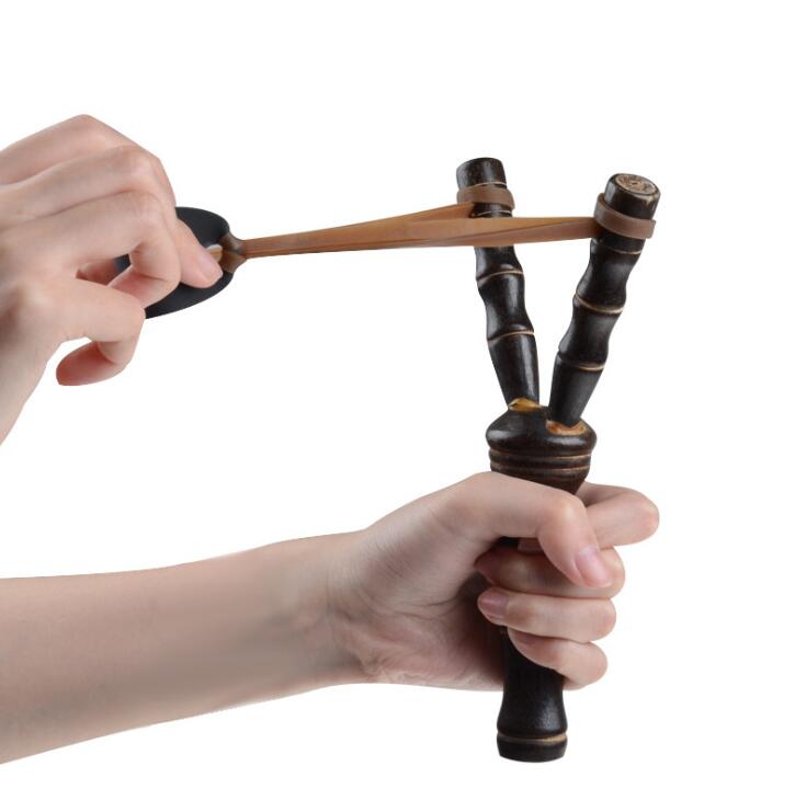 Wooden powerful slingshot Bamboo outdoor shooting Bamboo Style Wood kids Sling Shot Bow Catapult Hunting Originality Novelty funny Games
Wooden powerful slingshot Bamboo outdoor shooting Bamboo Style Wood kids Sling Shot Bow Catapult Hunting Originality Novelty funny Games