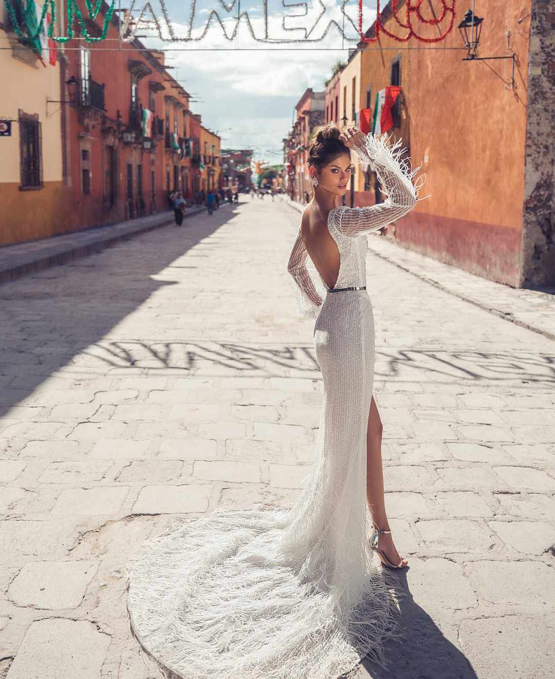 Julie Vino Luxury Mermaid Wedding Dresses 2019 Deep V Neck Long Sleeve Feathers Sequined Beach Wedding Dress High Split Sexy Bridal Gowns