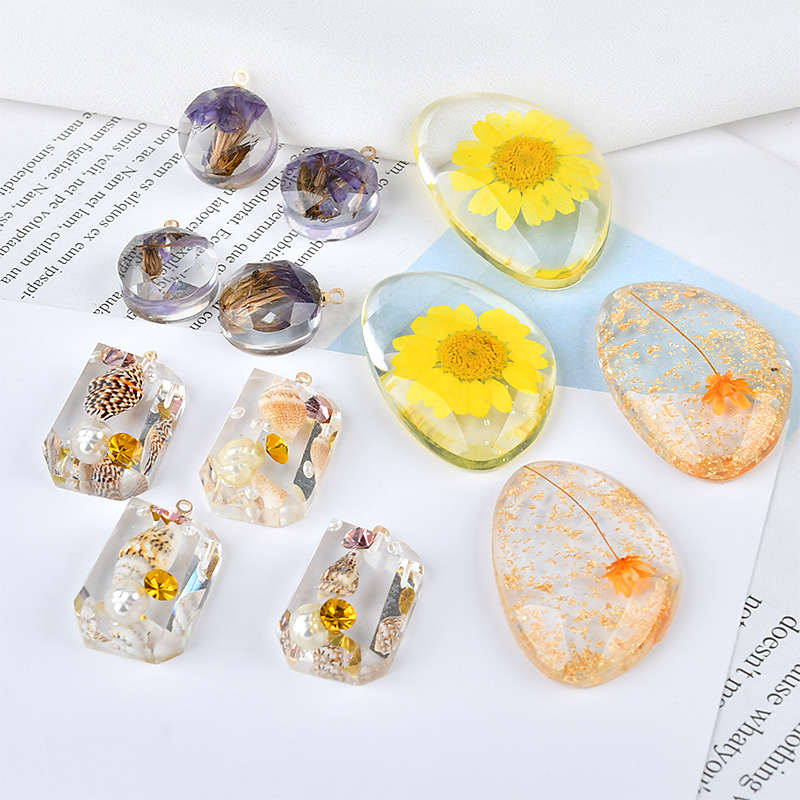 New Arrival 20pcs/Lot Transprent Style Colorful Dry Flower Decorated DIY jewelry Findings Resin Necklace pendants Ornament Charm
New Arrival 20pcs/Lot Transprent Style Colorful Dry Flower Decorated DIY jewelry Findings Resin Necklace pendants Ornament Charm