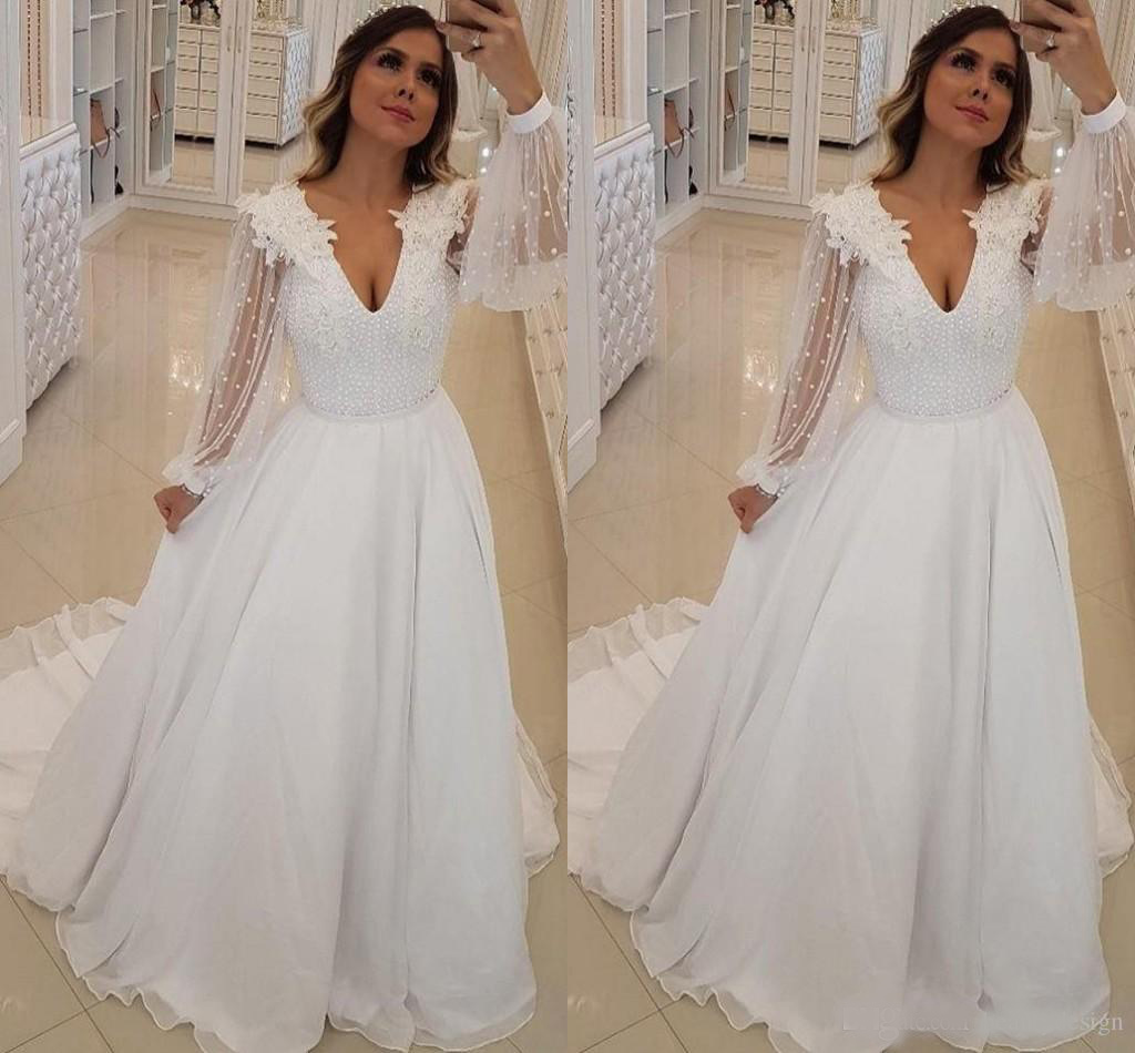 2020 Cheap Summer Bohemian White Wedding Dresses Poet Sheer Long Sleeves V Neck With Appliques Pearls Bridal Garden Beach Wedding Gowns