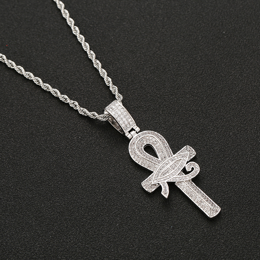 Pendant necklace, jewelry designer Eye of Horus cross moissanite pendant and sterling sier rope social gathering super face