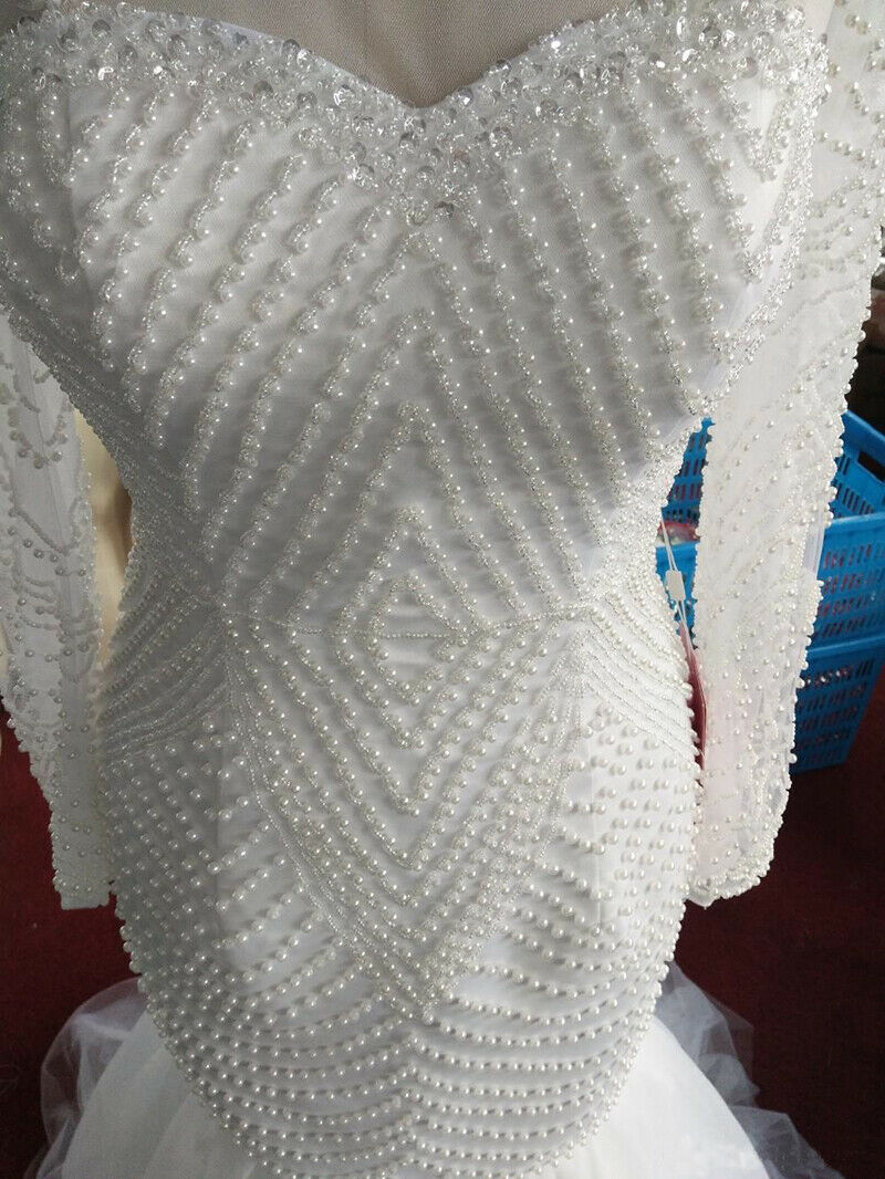 Luxury Full Beaded Mermaid Wedding Dresses Sheer Jewel Neck Long Sleeve Bridal Gowns South African Pearls Slim Floor Length Wedding Dress