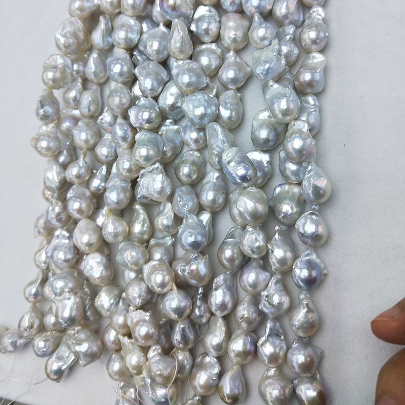 wholesale gorgeous strands high luster white top quality fireball pearl strands freshwater 14x20mm
wholesale gorgeous strands high luster white top quality fireball pearl strands freshwater 14x20mm