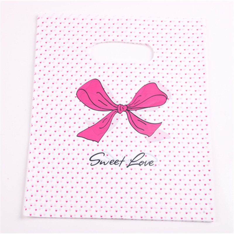New Design Wholesale 100pcs/lot 20*25cm Pink Sweet Love Packaging Bags For T-shirt Plastic Shopping Bags With Dot Bow
New Design Wholesale 100pcs/lot 20*25cm Pink Sweet Love Packaging Bags For T-shirt Plastic Shopping Bags With Dot Bow