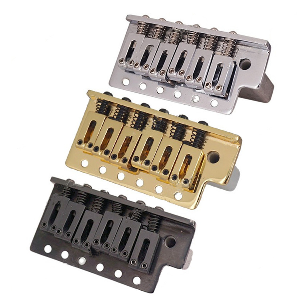A set of Left handed Electric Guitar Bridge Saddle Single Tremolo Bridge System Thickened Base Guitar Accessories guitar parts
A set of Left handed Electric Guitar Bridge Saddle Single Tremolo Bridge System Thickened Base Guitar Accessories guitar parts