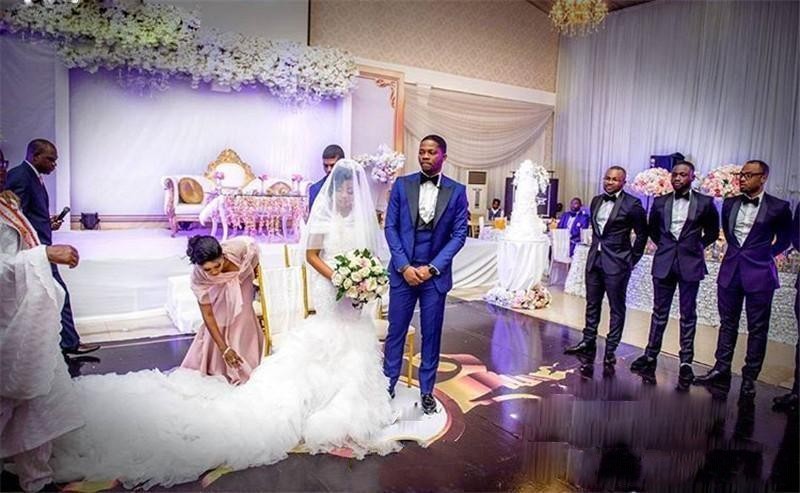 New Sexy African Mermaid Wedding Dresses Off Shoulder Lace Appliques Beaded Crystal Tiered Ruffles Open Back Chapel Train Bridal Gowns