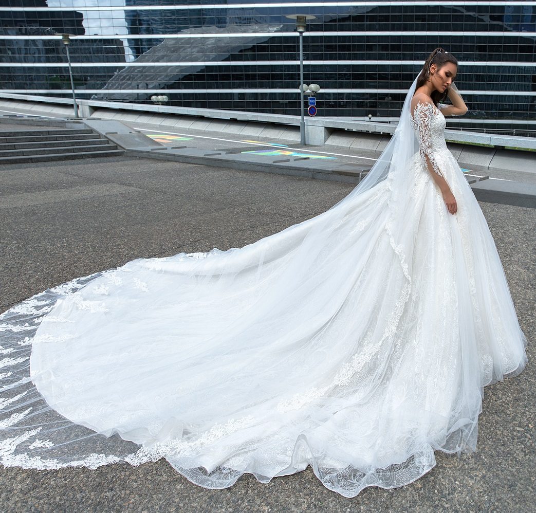 Classy Beaded Lace Wedding Dresses With Long Sleeves Appliqued A e Sheer Bateau Neck Bridal Gowns Cathedral Train Tulle vestido de novia