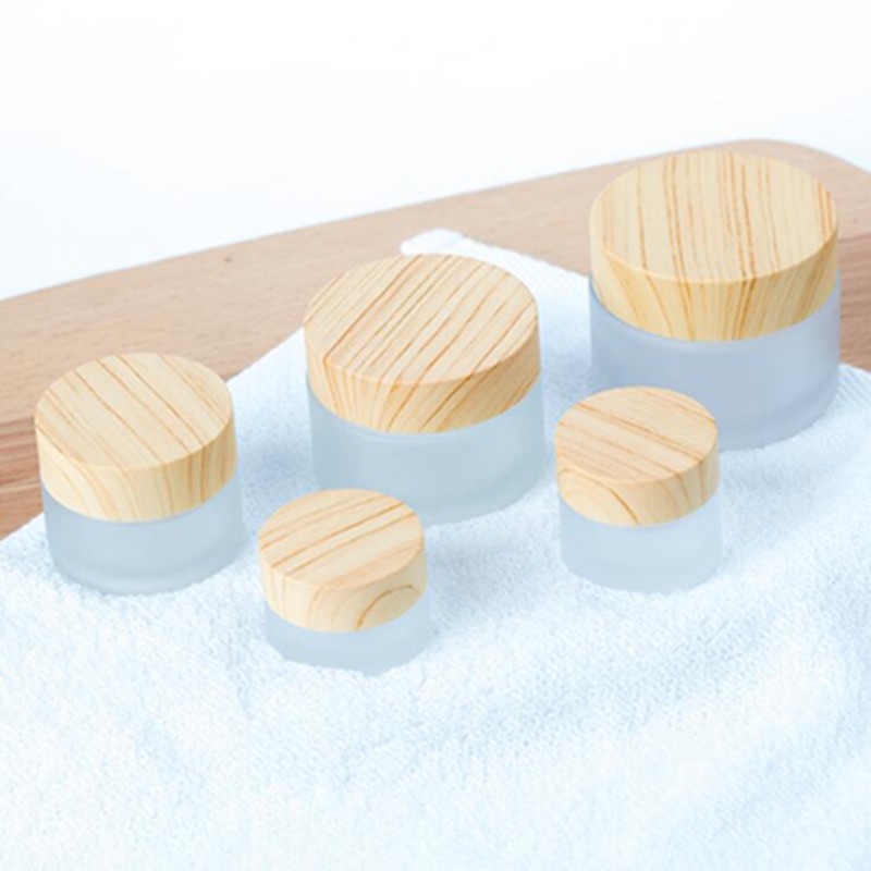 Frosted Glass Jar Cream Bottles Round Cosmetic Jars Hand Face Packing Bottles 5g 10g 15g 30g 50g Jars With Wood Cover
Frosted Glass Jar Cream Bottles Round Cosmetic Jars Hand Face Packing Bottles 5g 10g 15g 30g 50g Jars With Wood Cover