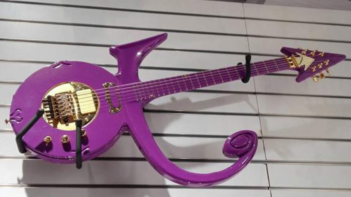 China Made Purple Prince Symbol Guitar Tremolo Bridge Gold Hardware custom made Abstract Symbol Purple Rain Guitar factory outlet
China Made Purple Prince Symbol Guitar Tremolo Bridge Gold Hardware custom made Abstract Symbol Purple Rain Guitar factory outlet