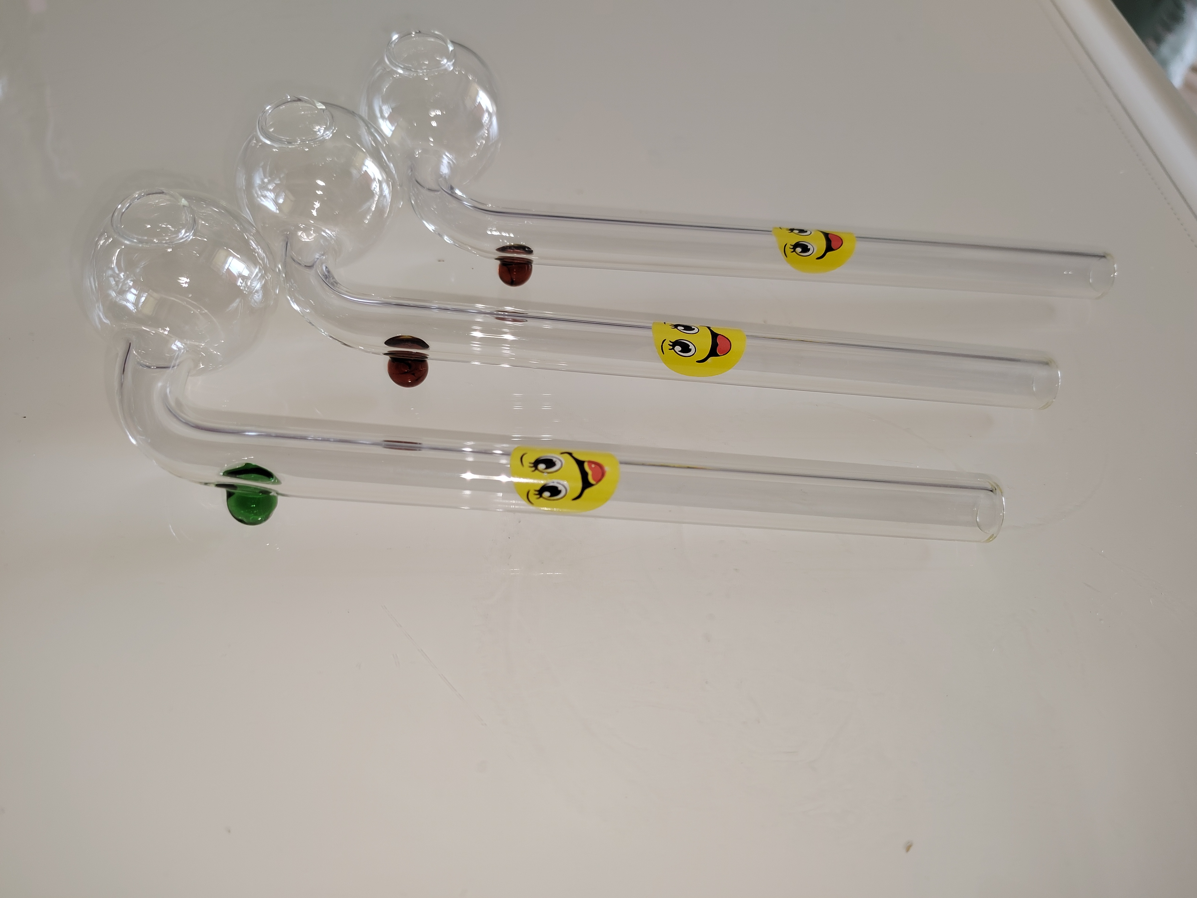 2020 new yellow smiley face glass elbow oil drilling pipe glass burner oil smoke pipe burning trap free delivery 111
2020 new yellow smiley face glass elbow oil drilling pipe glass burner oil smoke pipe burning trap free delivery 111