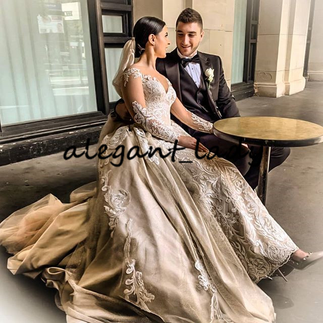 Illusion Long Sleeve Wedding Dresses with Detachable Train 2020 Plus Size Luxury Lace Applique Sheer Neck Princess Wedding Gown vestido