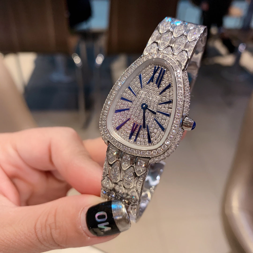 Fashion Women snake watch Luxury designer Diamond shining Wristwatch Rhinestone Dress Watch silver gold ladies Bracelet Crystal quartz Clock, Model 1
Fashion Women snake watch Luxury designer Diamond shining Wristwatch Rhinestone Dress Watch silver gold ladies Bracelet Crystal quartz Clock, Model 1
