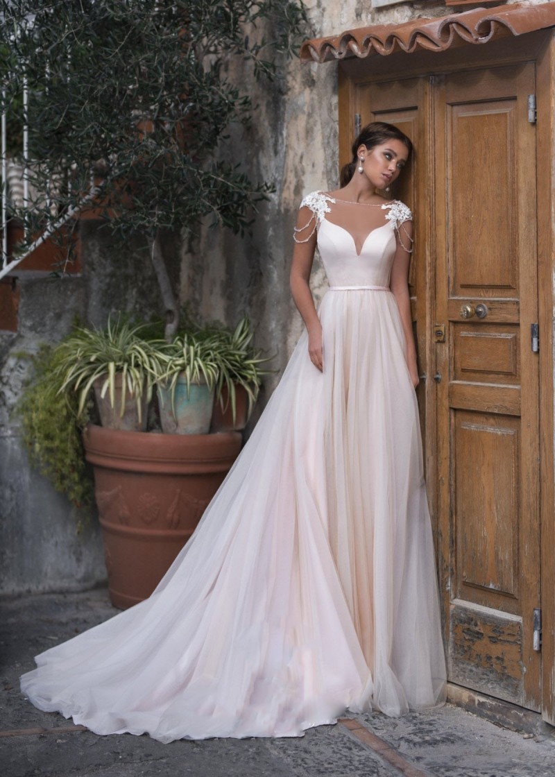 Modest A Line Wedding Dresses Jewel Short Sleeve Backless Lace Applique Tassel Beading Sash Wedding Gowns Sweep Train robe de mariée