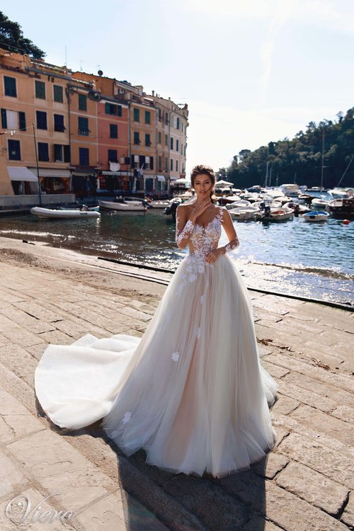 2019 Naviblue Long Sleeve Wedding Dresses Sheer Jewel Neck Lace Appliqued A Line Beach Wedding Dress Sweep Train Custom Country Bridal Gowns