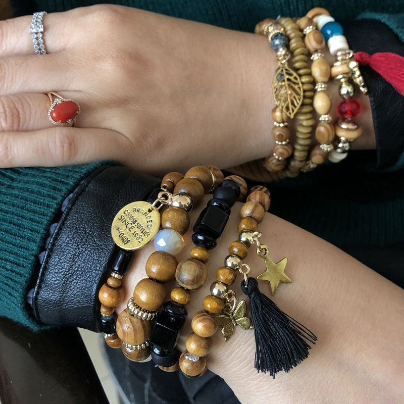 2020 Hot Sale Wooden Beads Bracelet Black Gem with Tassel Bracelet Multilayer Pendant Charm Charm Bracelets & Bangles
2020 Hot Sale Wooden Beads Bracelet Black Gem with Tassel Bracelet Multilayer Pendant Charm Charm Bracelets & Bangles
