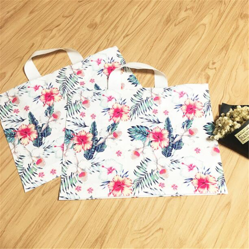 50Pcs/Lot Plastic Gift Bags With Handles Packing Bag For Wedding Party Supplies Baking Package Bags Shops Flowers Birthday Pouch
50Pcs/Lot Plastic Gift Bags With Handles Packing Bag For Wedding Party Supplies Baking Package Bags Shops Flowers Birthday Pouch