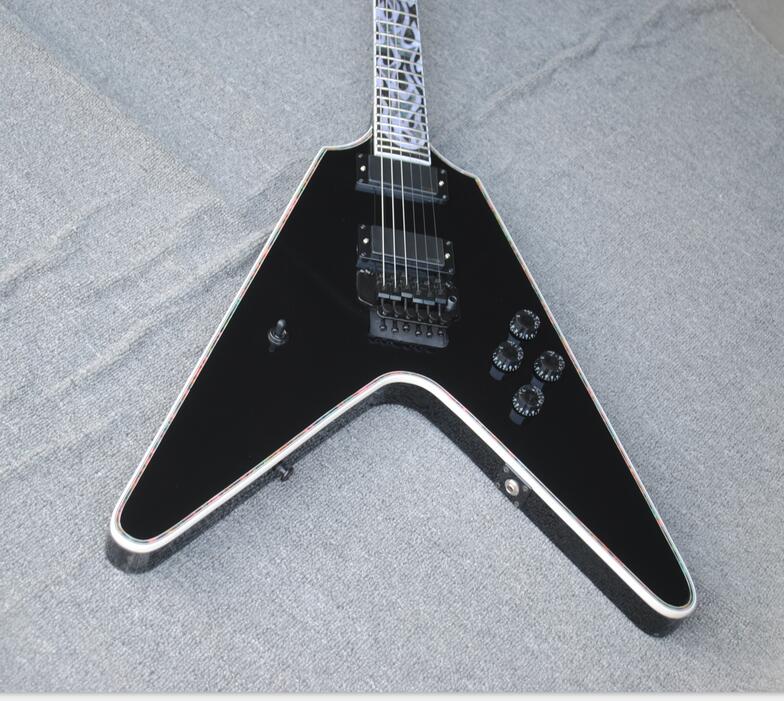 Flamethrower Flying V Ultima Fire Tiger Glos Black Electric Guitar Floyd Rose Tremolo, Intricate MOP & Abalone Flame Inlay, Black Hardware
Flamethrower Flying V Ultima Fire Tiger Glos Black Electric Guitar Floyd Rose Tremolo, Intricate MOP & Abalone Flame Inlay, Black Hardware