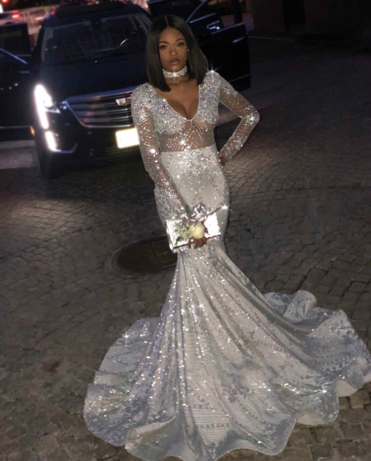2019 Sparkly Silver Mermaid Prom Dresses Appliqued Sequins Long Sleeve African Evening Dress Sweep Train V Neck Illusion Formal Party Gown