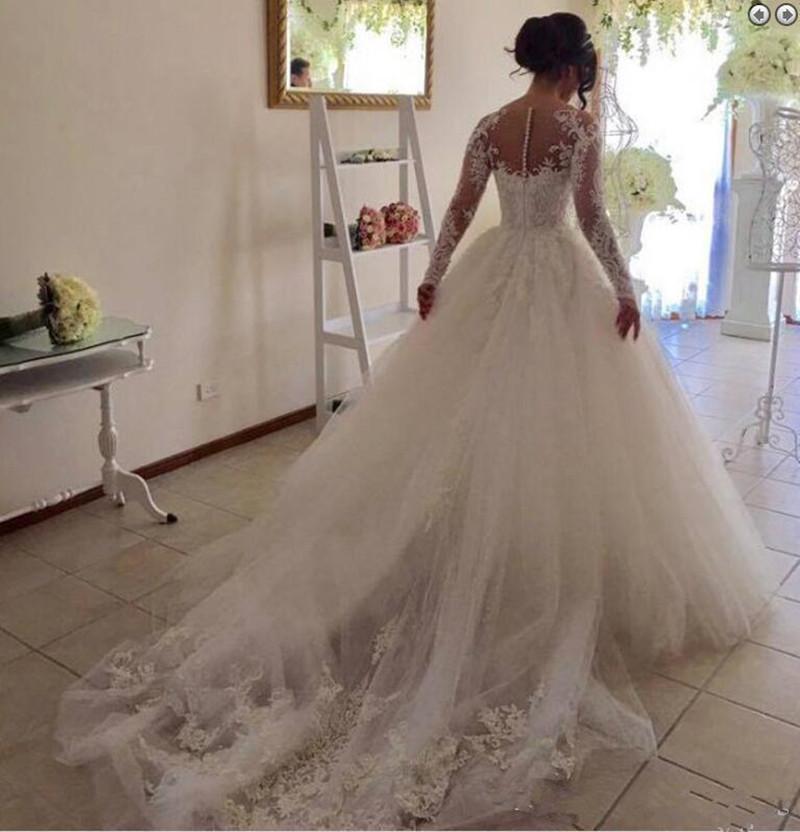 African Illusion Jewel Long Sleeves Wedding Dresses With Beading Appliques Chapel Train Puffy Skirt Arabic Church Bridal Gowns Plus Size Z50 0510