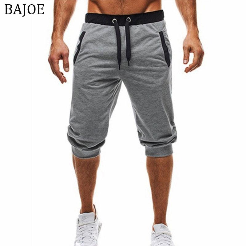 Summer men Joggers Men Knee Length Shorts Color Patchwork Joggers Short Sweatpants Trousers Men Bermuda Shorts masculina, Black
Summer men Joggers Men Knee Length Shorts Color Patchwork Joggers Short Sweatpants Trousers Men Bermuda Shorts masculina, Black
