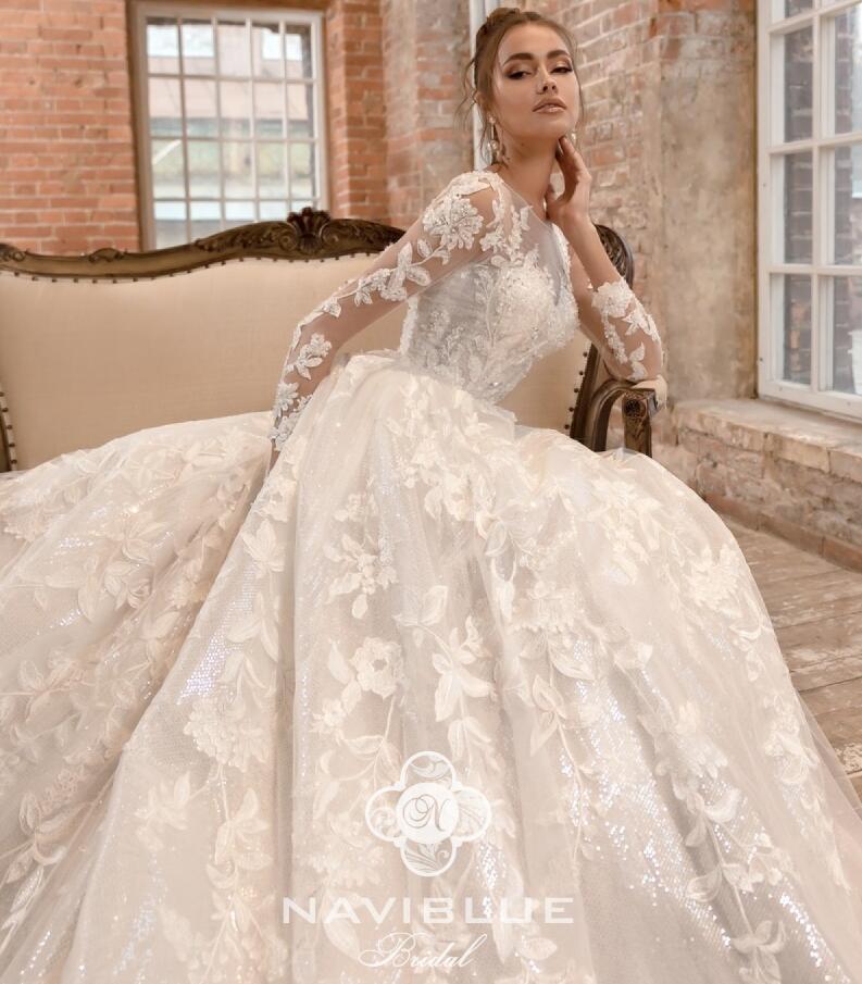 2019 Naviblue Dolly Beach Wedding Dresses Jewel Neck Lace Appliqued A Line Glitter Long Sleeve Modest Wedding Dress Court Train Bridal Gowns