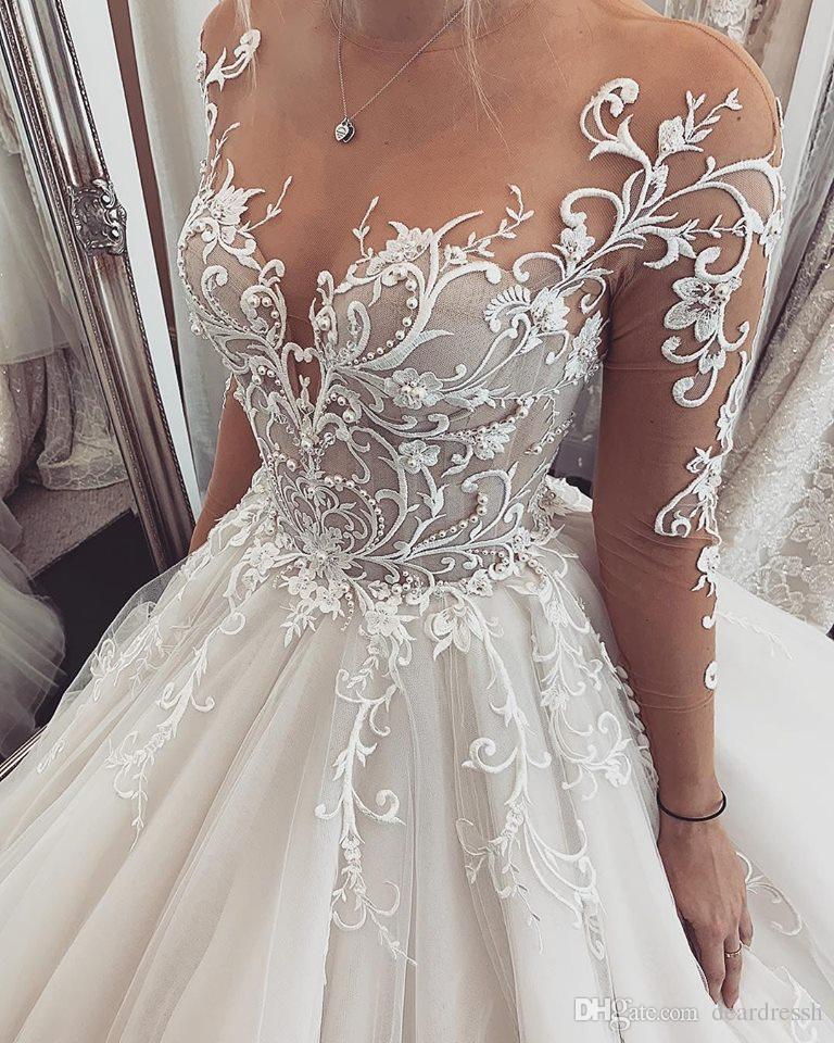 2019 Gorgeous Modest Wedding Dresses Sheer Jewel Neck Lace Appliqued Long Train Country Wedding Gowns Long Sleeve Bridal Dress Beach Occasio