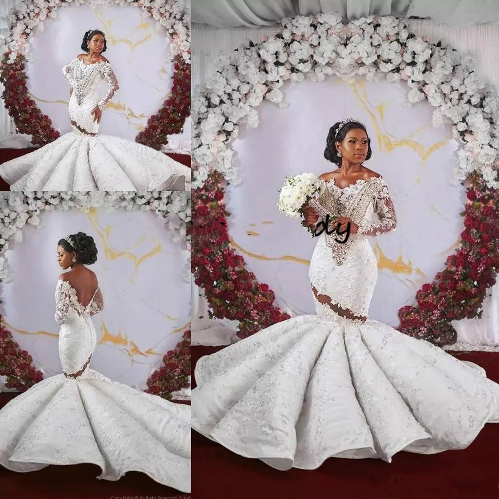 Arabic Puffy Skirt Mermaid Wedding Dresses with Long Sleeve 2020 luxury Lace Appliqued African Plus Size Wedding Dresses Off Shoulder Gowns, Same as image
Arabic Puffy Skirt Mermaid Wedding Dresses with Long Sleeve 2020 luxury Lace Appliqued African Plus Size Wedding Dresses Off Shoulder Gowns, Same as image