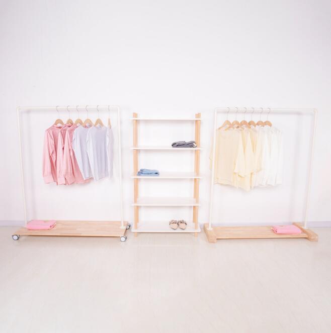 Wooden floor hanger Bedroom Furniture Clothing shop iron wood roller platform modeling creative simple Nordic style display series rack
