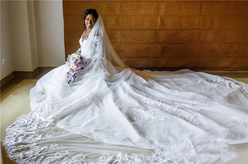 Vintage African Mermaid Wedding Dresses with Detachable Train Long Sleeves Buttons Back Beach Wedding Gowns Lace Sequined vestido de novia