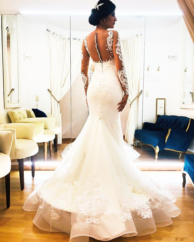 Illusion Long Sleeve Mermaid Wedding Dresses 2020 Sheer Jewel Neck Lace Applique Trumpet Sweep Train Aso Ebi Bride Wedding Gown