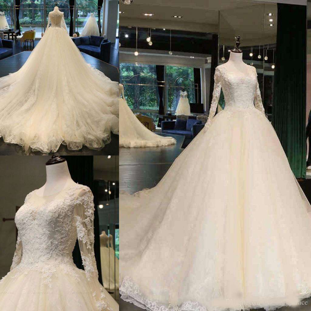 2020 Newest Jewel Neck A-line Wedding Dresses Cathedral Train Appliques Beaded Long Sleeve Button up Back Bridal Wedding Gowns