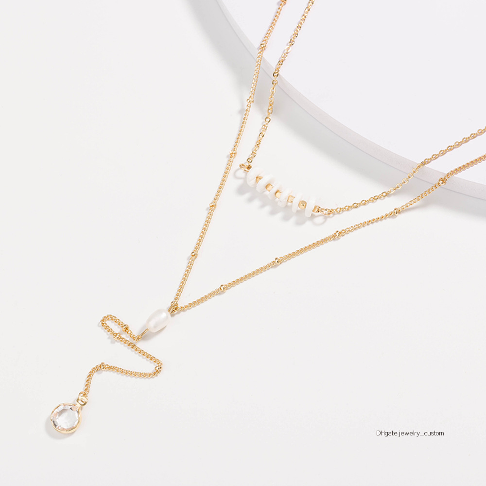 Personality Ma'am Ornaments Shell Piece Clavicle Chain Natural Pearl Golden Package The Edge Of The Water Crystal Multi-storey Necklace
Personality Ma'am Ornaments Shell Piece Clavicle Chain Natural Pearl Golden Package The Edge Of The Water Crystal Multi-storey Necklace