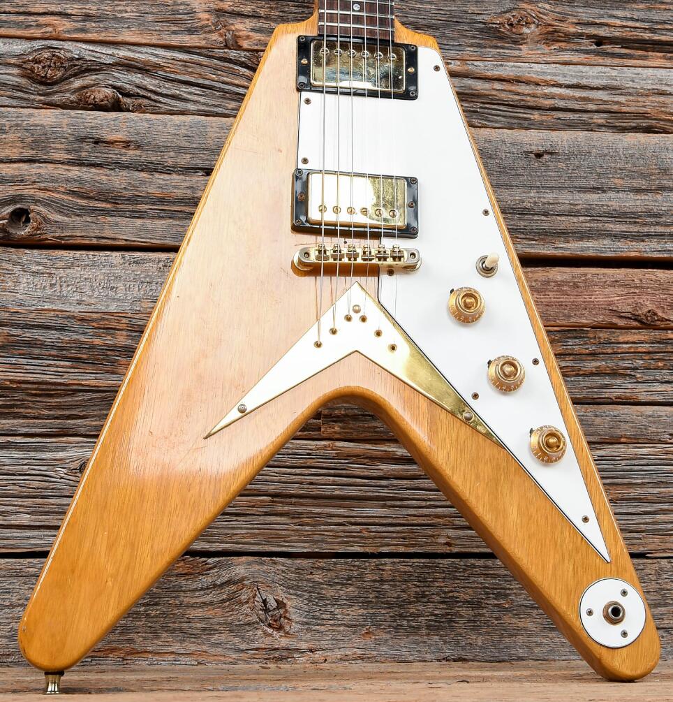 Custom Shop Flying V Heritage Natural Korina 1983 Electric Guitar White Pickguard, Little Peg ABR 1 Bridge (String Thru Body), Gold Hardware
Custom Shop Flying V Heritage Natural Korina 1983 Electric Guitar White Pickguard, Little Peg ABR 1 Bridge (String Thru Body), Gold Hardware