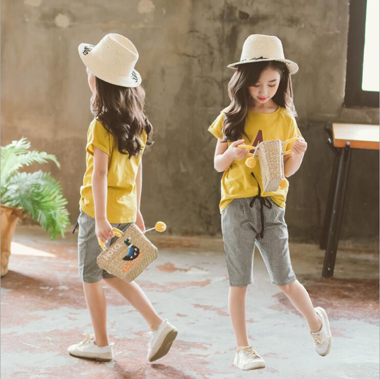 girls clothing sets wholesale 2020 summer teen girls yellow letter tops+plaid pocket shorts 2pcs set children suits outfits
girls clothing sets wholesale 2020 summer teen girls yellow letter tops+plaid pocket shorts 2pcs set children suits outfits