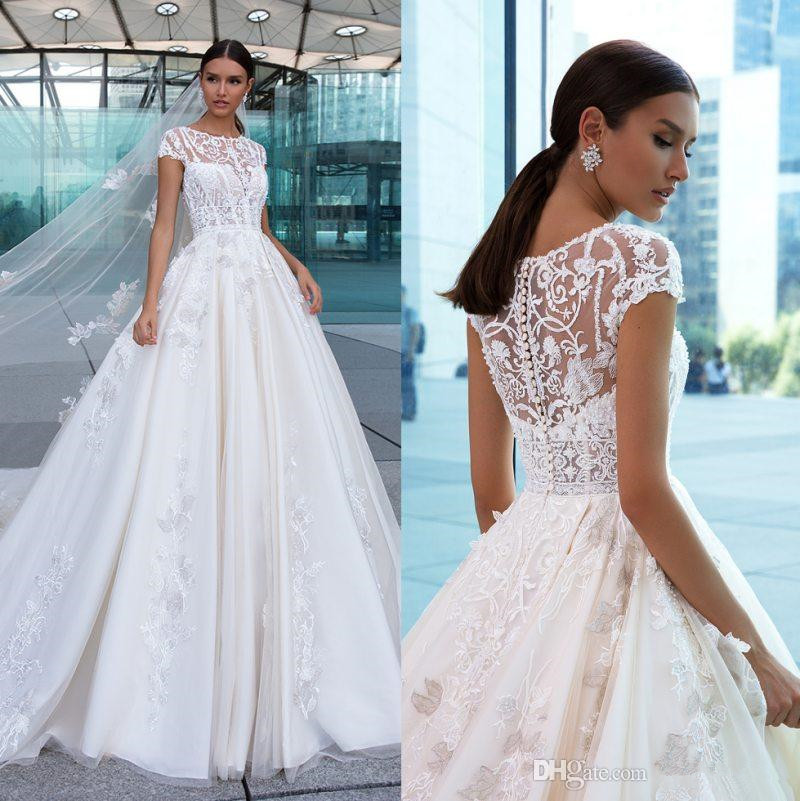 Elegant Lace Beaded A Line Wedding Dresses 2020 Sheer Bateau Neck Appliqued Bridal Gowns Buttons Back Chapel Train Tulle vestido de novia, White
Elegant Lace Beaded A Line Wedding Dresses 2020 Sheer Bateau Neck Appliqued Bridal Gowns Buttons Back Chapel Train Tulle vestido de novia, White