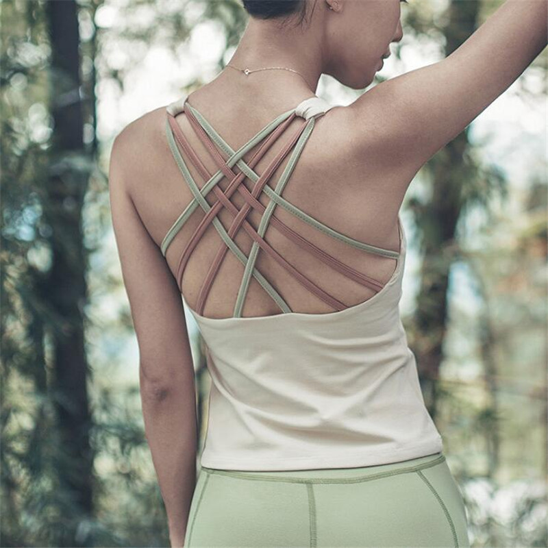 Sports top women' yoga vest quick-drying breathable cross straped sexy bra with pad beautyback shockproof fitness workout shirt, White
Sports top women' yoga vest quick-drying breathable cross straped sexy bra with pad beautyback shockproof fitness workout shirt, White