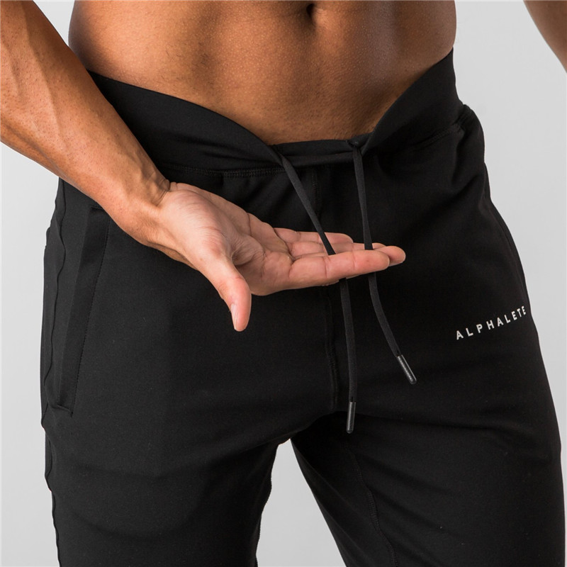Mens Pants Autumn Winter Fitness Men Gyms Pants Fashion Cotton Pencil Pants Bodybuilding Trousers Jogger Asian Size