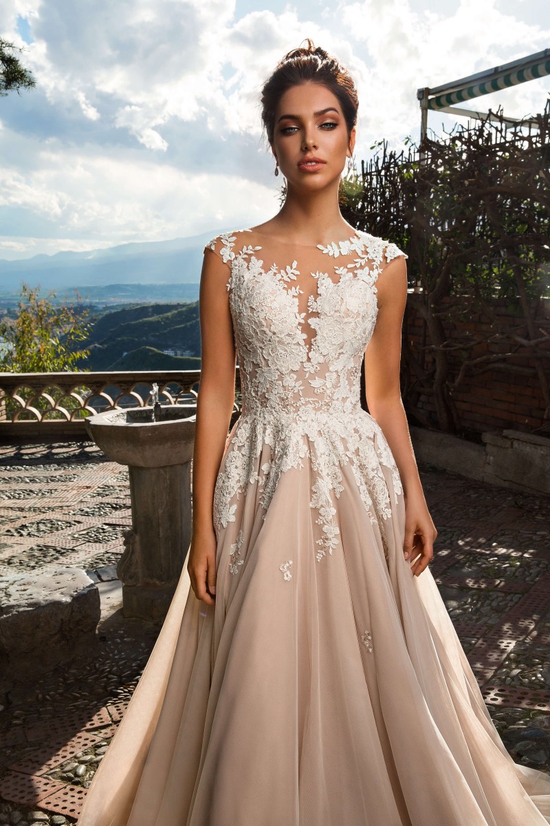 Innocentia A Line Wedding Dresses Sheer Baetau Neck Lace Bridal Gowns Sleeveless Illusion Back Boho Wedding Dress Cheap vestido de novia