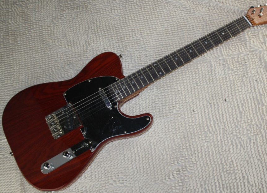 Custom Shop George Harrison Brown Sandwich Tele Electric Guitar Ash Wood Body, Rosewood Fingerboard, Vintage Tuners, 3 Brass Saddle Bridge
Custom Shop George Harrison Brown Sandwich Tele Electric Guitar Ash Wood Body, Rosewood Fingerboard, Vintage Tuners, 3 Brass Saddle Bridge