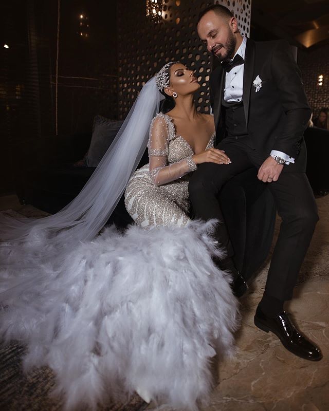 luxury dubai mermaid wedding dress bling bling sequins sheer long sleeve bridal gowns feather sweep train beach wedding dress