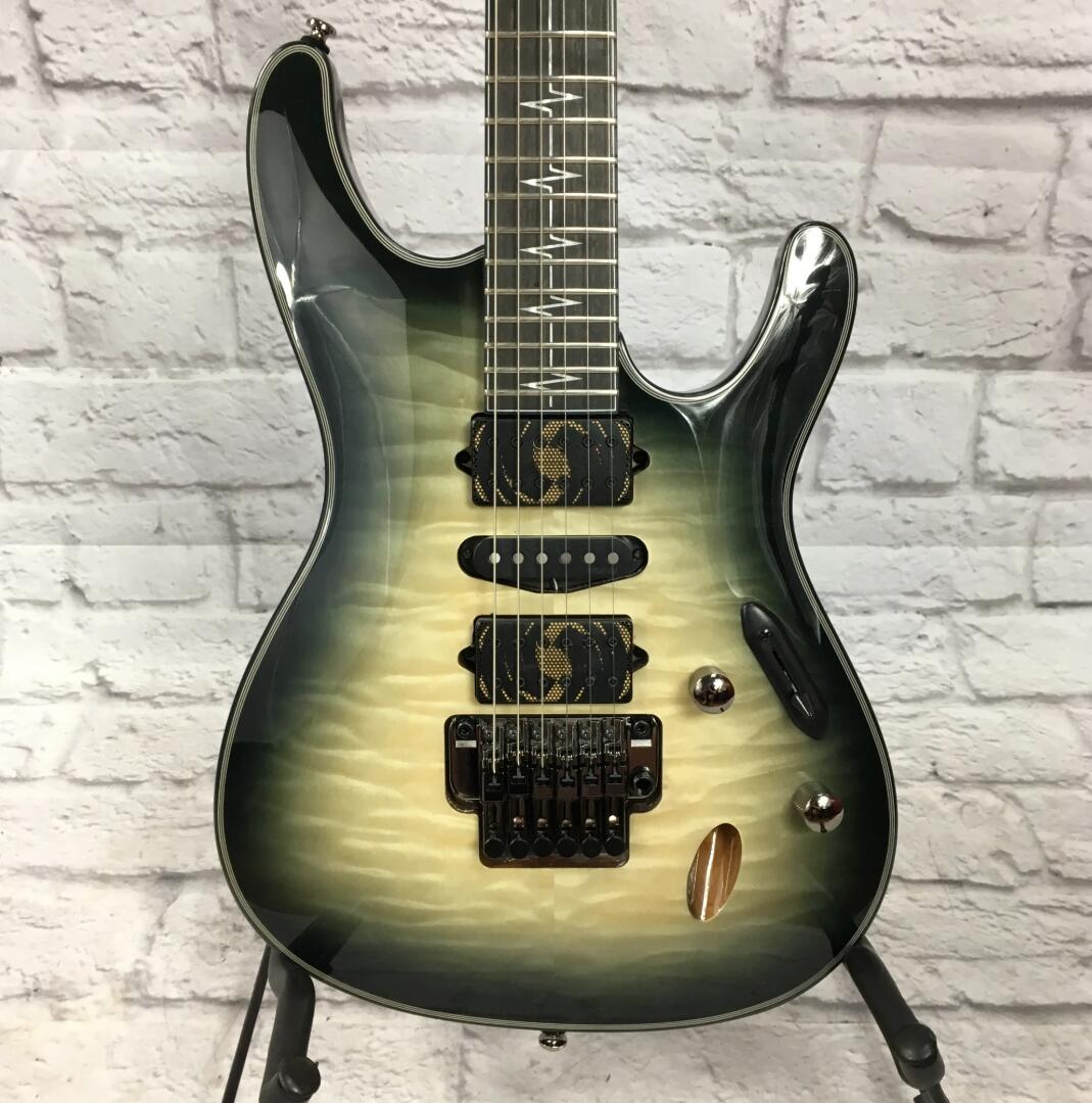 JIVA 10 Nita Strauss Signature Deep Space Blond Quilted Maple Electric Guitar 3 Piece Maple Purpleheart Neck, Vibrato Bridge, Black Hardware
JIVA 10 Nita Strauss Signature Deep Space Blond Quilted Maple Electric Guitar 3 Piece Maple Purpleheart Neck, Vibrato Bridge, Black Hardware