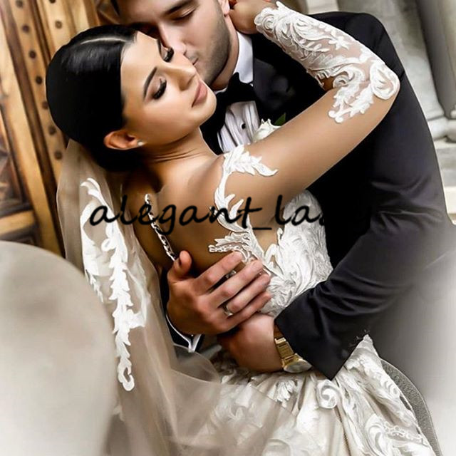 Illusion Long Sleeve Wedding Dresses with Detachable Train 2020 Plus Size Luxury Lace Applique Sheer Neck Princess Wedding Gown vestido