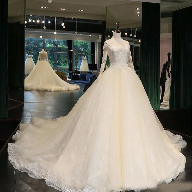 2020 Newest Jewel Neck A-line Wedding Dresses Cathedral Train Appliques Beaded Long Sleeve Button up Back Bridal Wedding Gowns