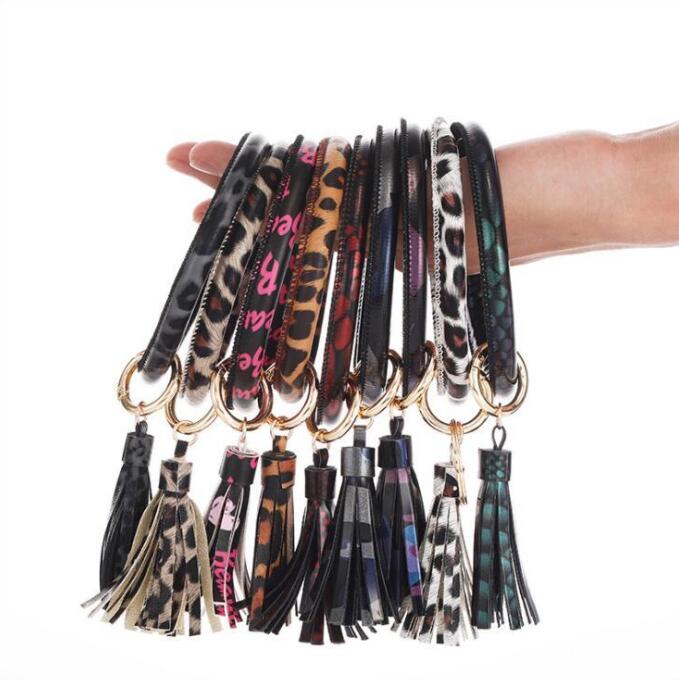 Tassel Bangle Leopard Keychain Bracelets Keyring Leather O Wristlet Bracelet Circle Key Ring Keyring Holder Girls Pendant Wristbands C6595
Tassel Bangle Leopard Keychain Bracelets Keyring Leather O Wristlet Bracelet Circle Key Ring Keyring Holder Girls Pendant Wristbands C6595