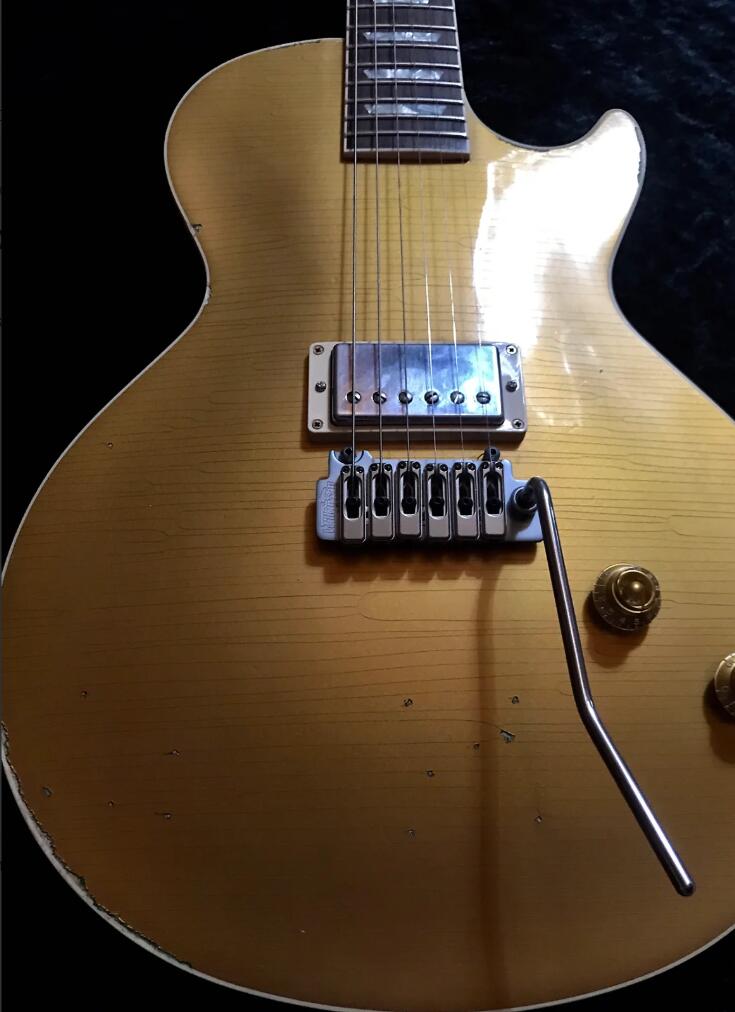 Joe Perry Gold Rush Axcess Aged Relic Antique Goldtop Electric Guitar Korean Tremolo Bridge, Single Humbucker, CarvedAxcess Neck Joint 
Joe Perry Gold Rush Axcess Aged Relic Antique Goldtop Electric Guitar Korean Tremolo Bridge, Single Humbucker, CarvedAxcess Neck Joint