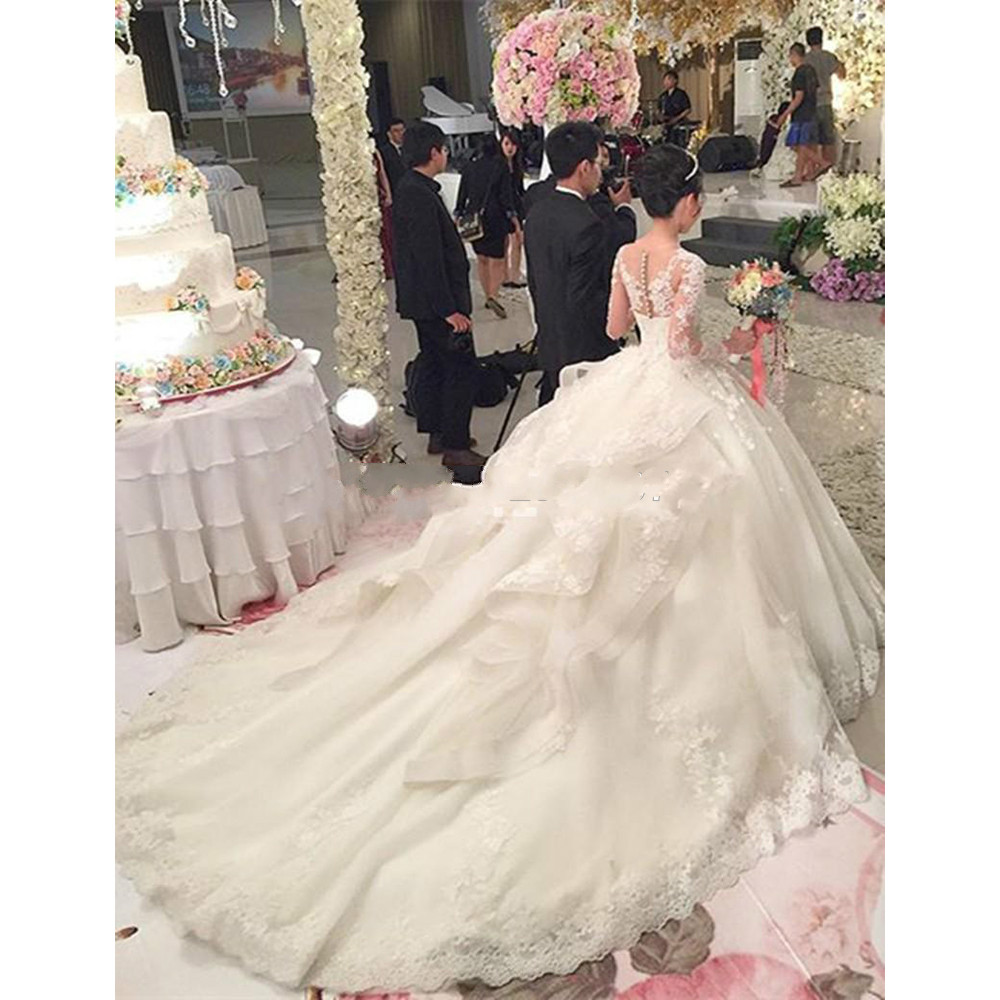 luxury ivory puffy ball gown lace wedding dresses with cathedral train organza beaded corset top Illusion long sleeve princess bridal gowns