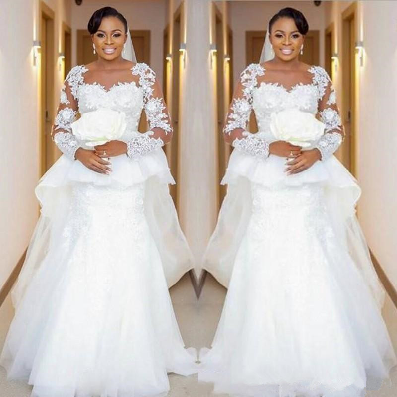 2020 Cheap African Plus Size Mermaid Wedding Dresses Jewel Neck Lace Appliques Beads Long Sleeves Peplum Sweep Train Dubai Bridal Gowns, Champagne
2020 Cheap African Plus Size Mermaid Wedding Dresses Jewel Neck Lace Appliques Beads Long Sleeves Peplum Sweep Train Dubai Bridal Gowns, Champagne