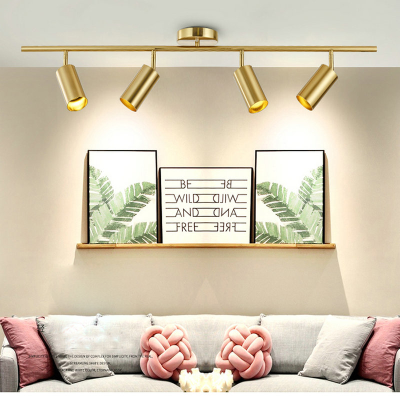 Nordic wall-mounted LED ceiling lights with creative track spotlight design for living rooms, restaurants, bars, and clothing stores in gold finish