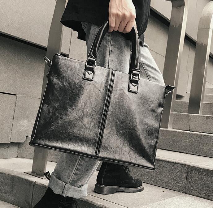 Wholesale brand men handbag simple sewing casual handbag portable large capacity business briefcases soft leather shoulder bag computer bag
Wholesale brand men handbag simple sewing casual handbag portable large capacity business briefcases soft leather shoulder bag computer bag